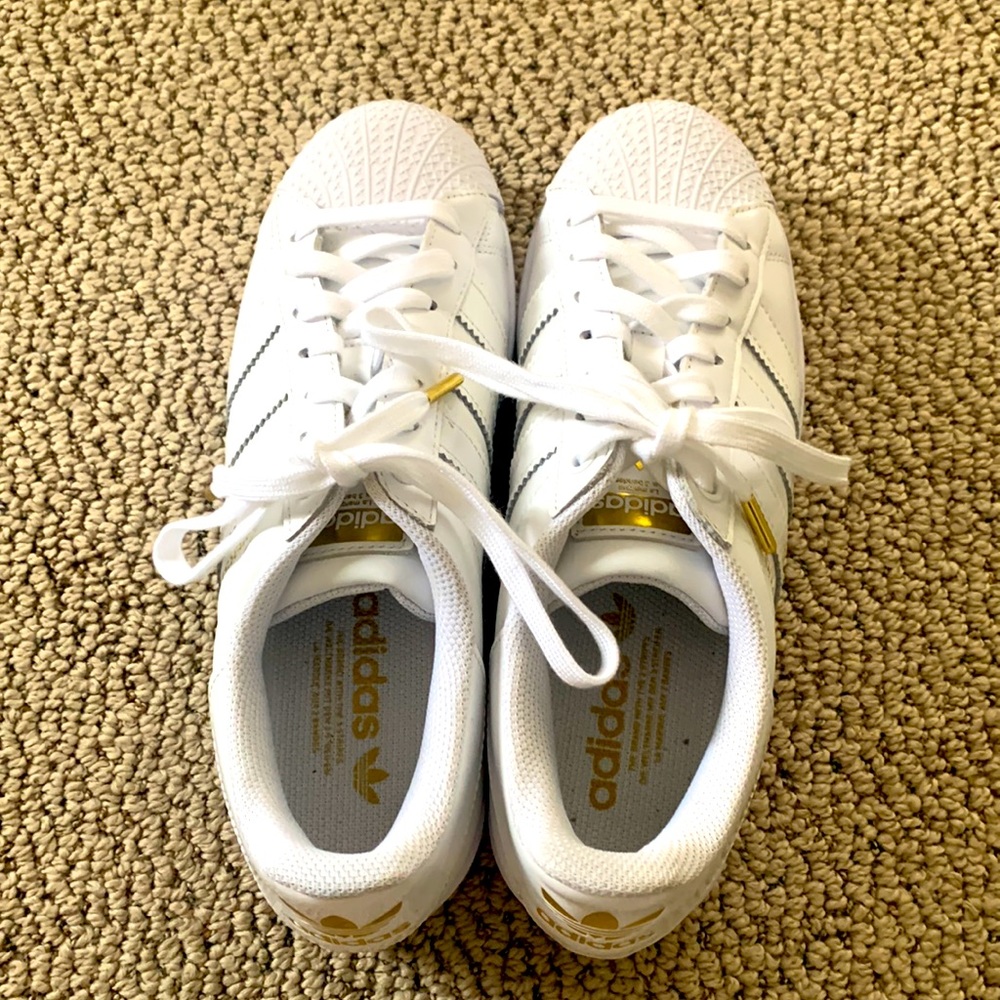 Brand new size 8 adidas barely worn, maybe once without tags